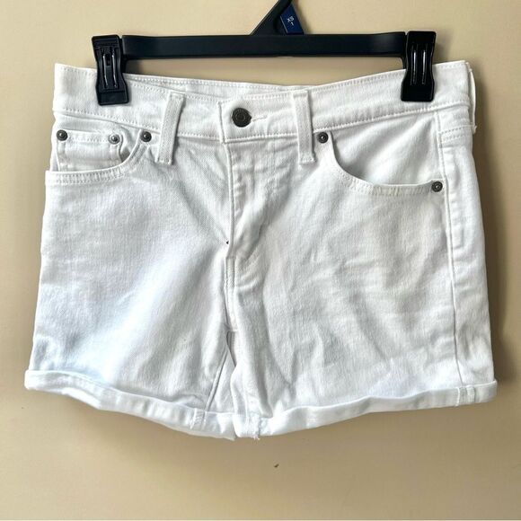 Levi’s mid length white jean shorts.  Size 26( 2) - Picture 2 of 6